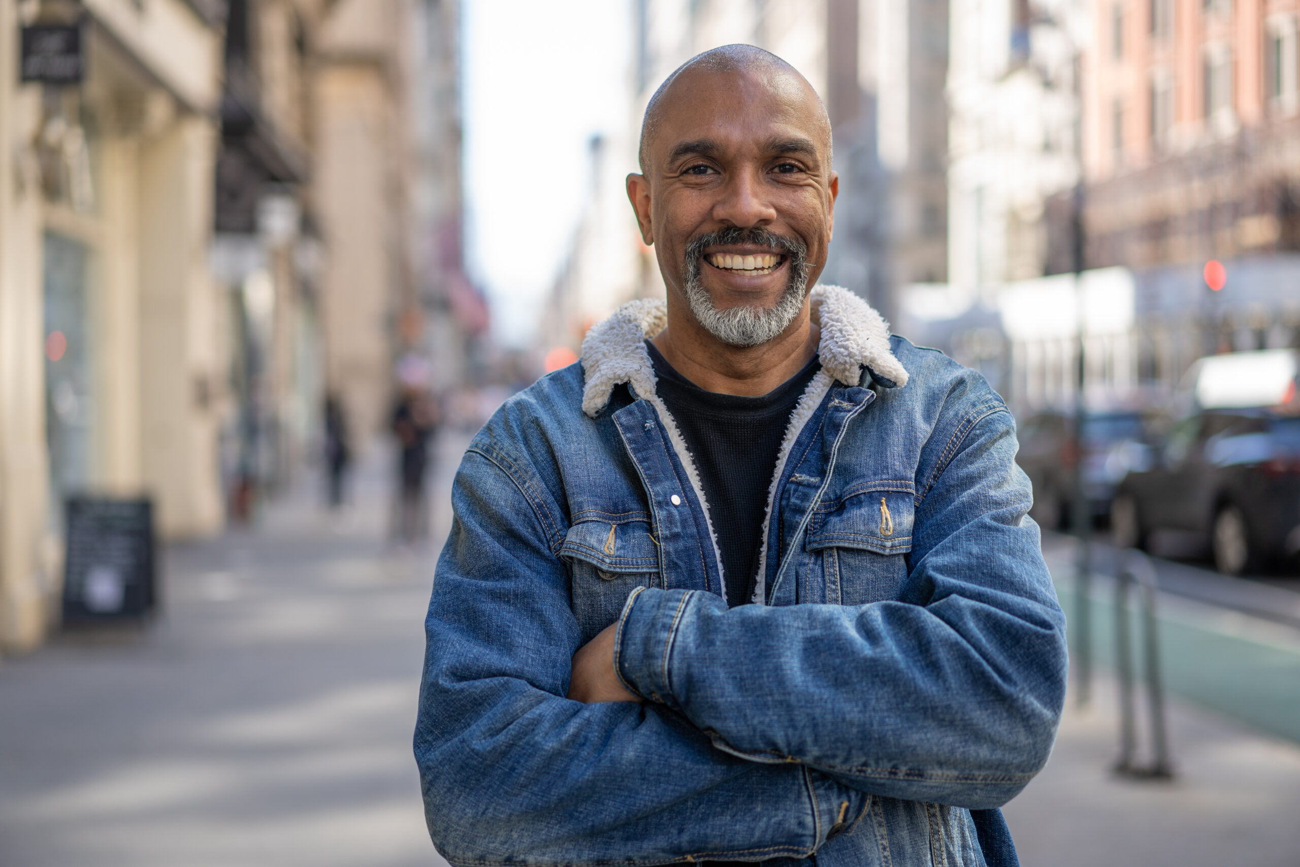 Mature black man in city smile happy face portrait